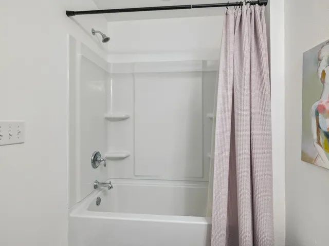 a bathroom with a bathtub