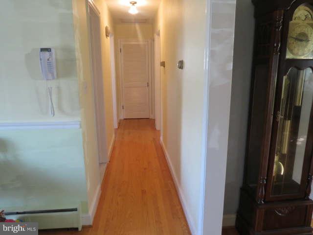 9205 Gue Road Damascus, MD 20872 - Photo 22 of 27 a view of a bathroom from a hallway