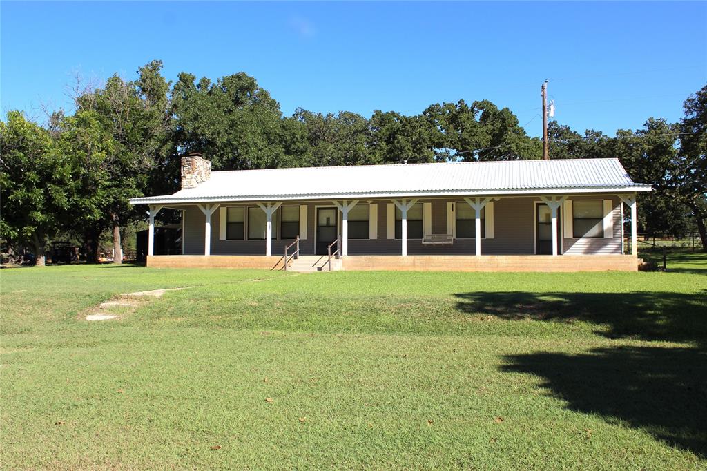 5050 Highway 67, Unit 377N Comanche, TX 76442 - Photo 2 of 30 a view of house with a garden space