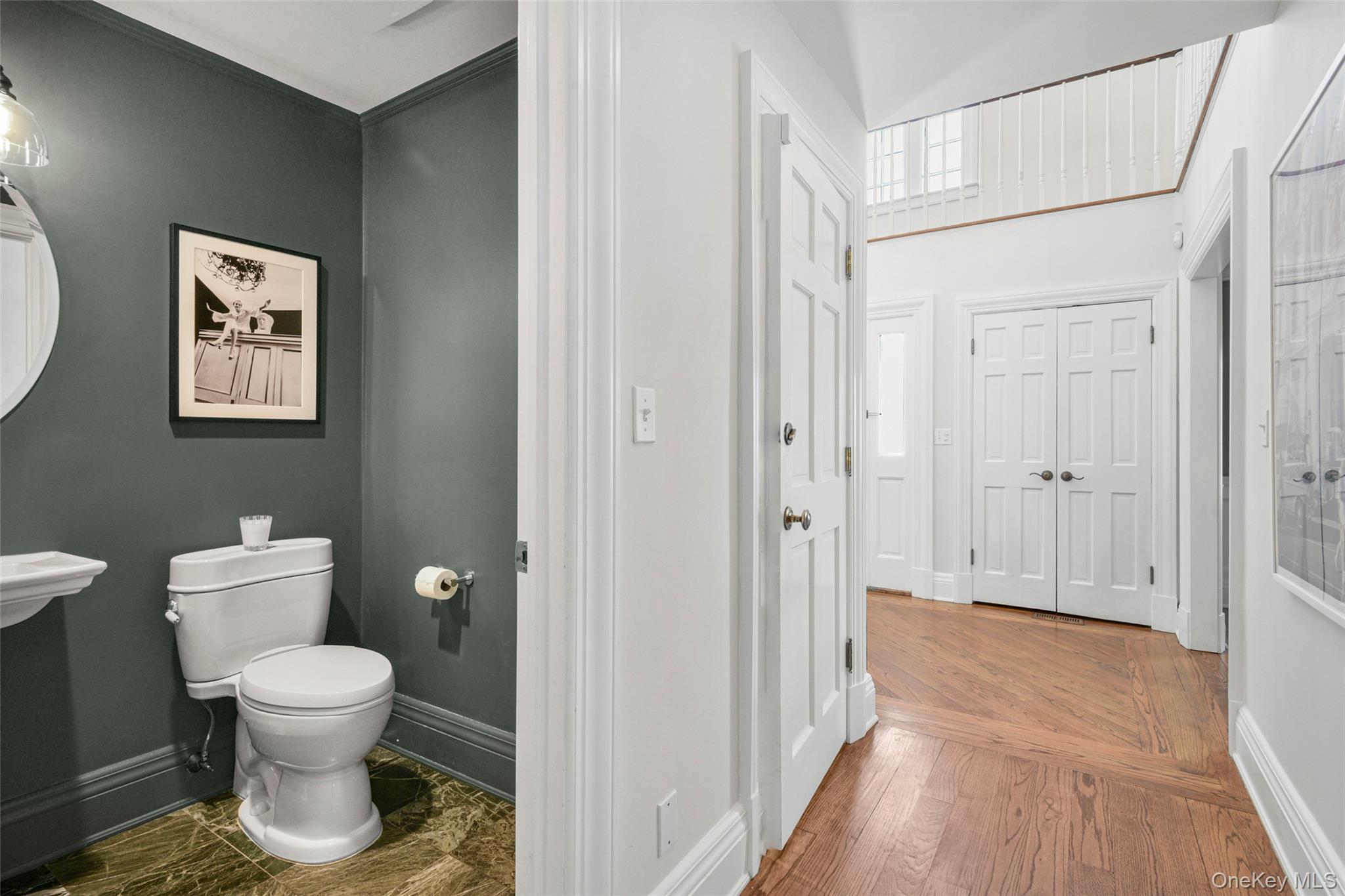 10 Hilltop Road Larchmont, NY 10538 - Photo 17 of 50 First-level hall powder room.