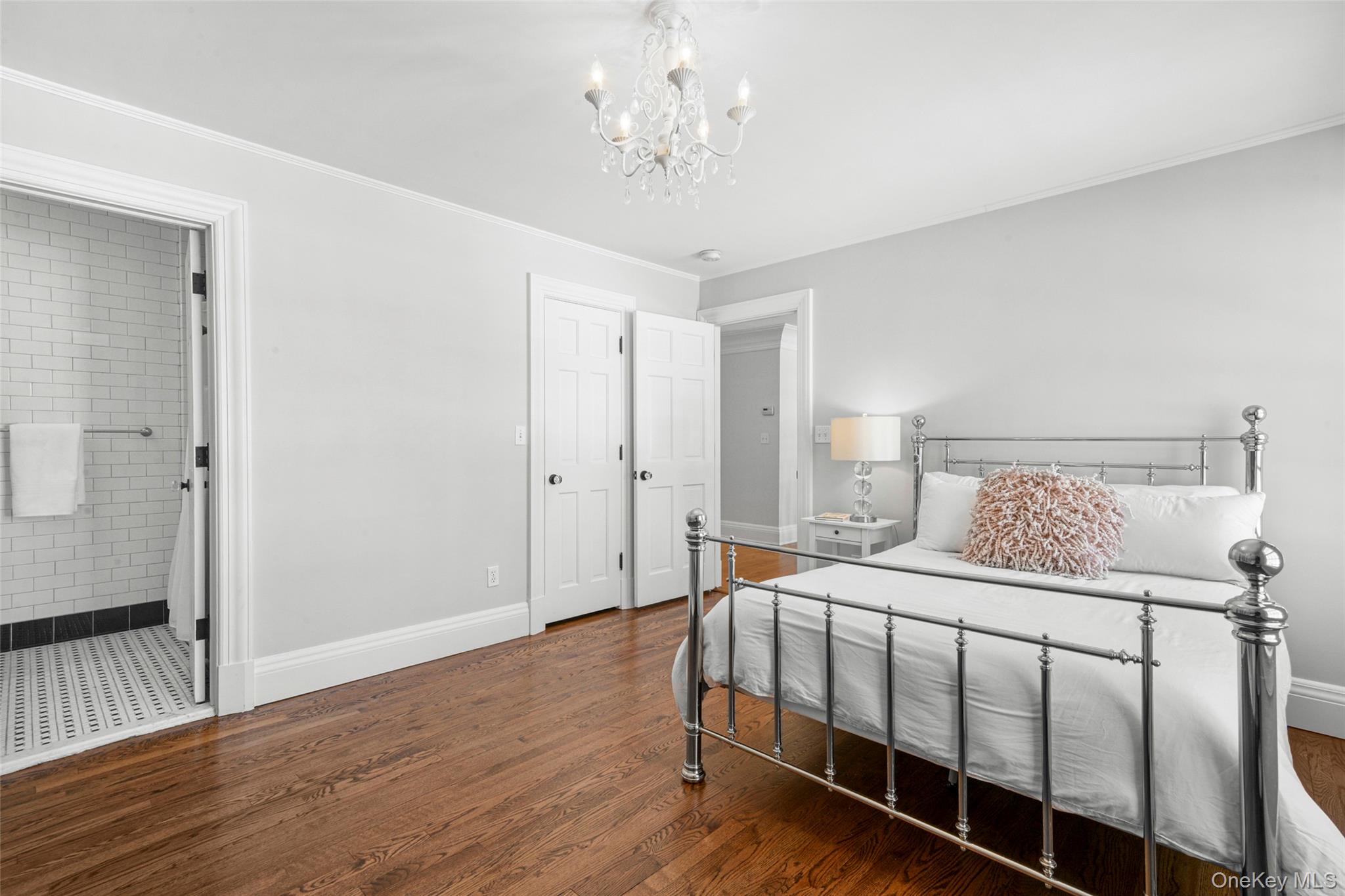10 Hilltop Road Larchmont, NY 10538 - Photo 29 of 50 En-suite bedroom with a view of the bathroom.