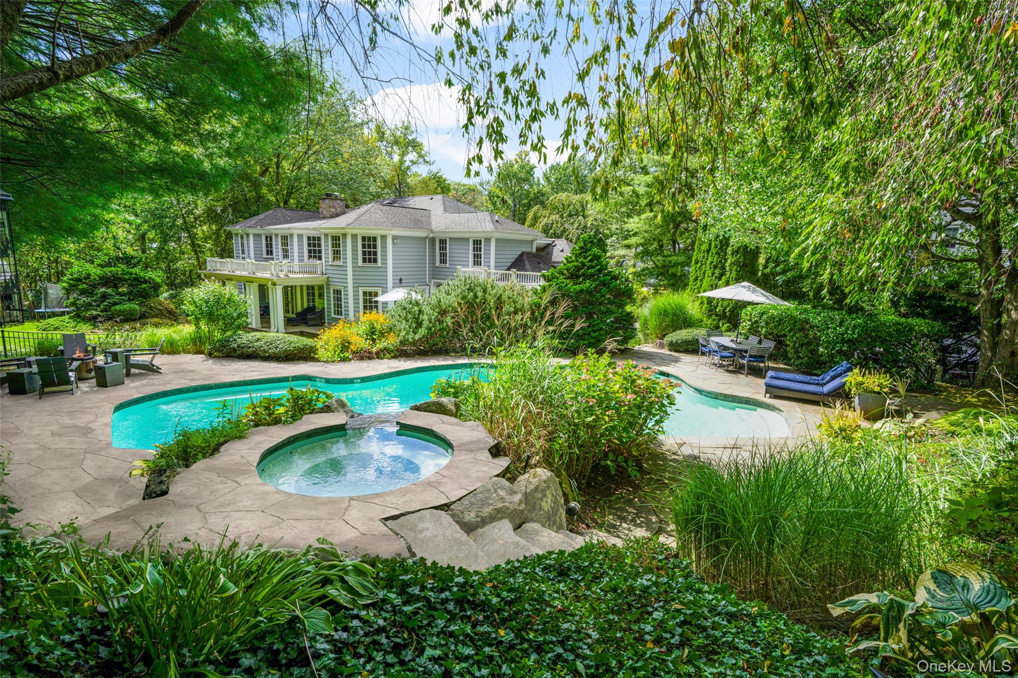 10 Hilltop Road Larchmont, NY 10538 - Photo 44 of 50 Pool area and view of the back of the property.
