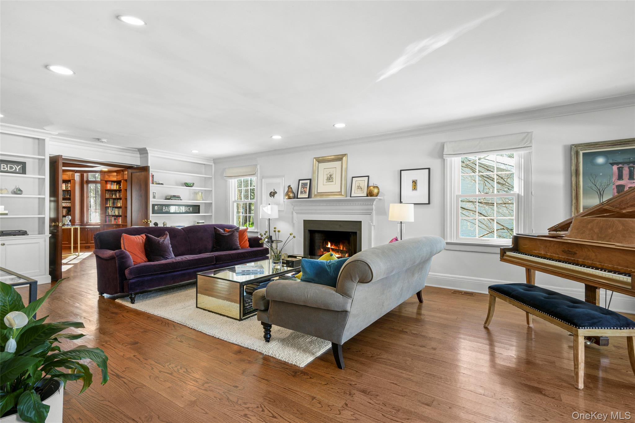10 Hilltop Road Larchmont, NY 10538 - Photo 5 of 50 Light-filled living room with beautiful built-ins and French doors leading to the library/office.