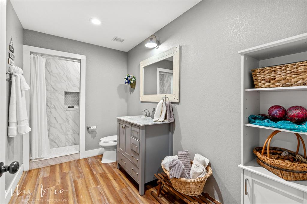 342 County Road 644 Merkel, TX 79536 - Photo 13 of 36 a bathroom with a sink toilet and shower