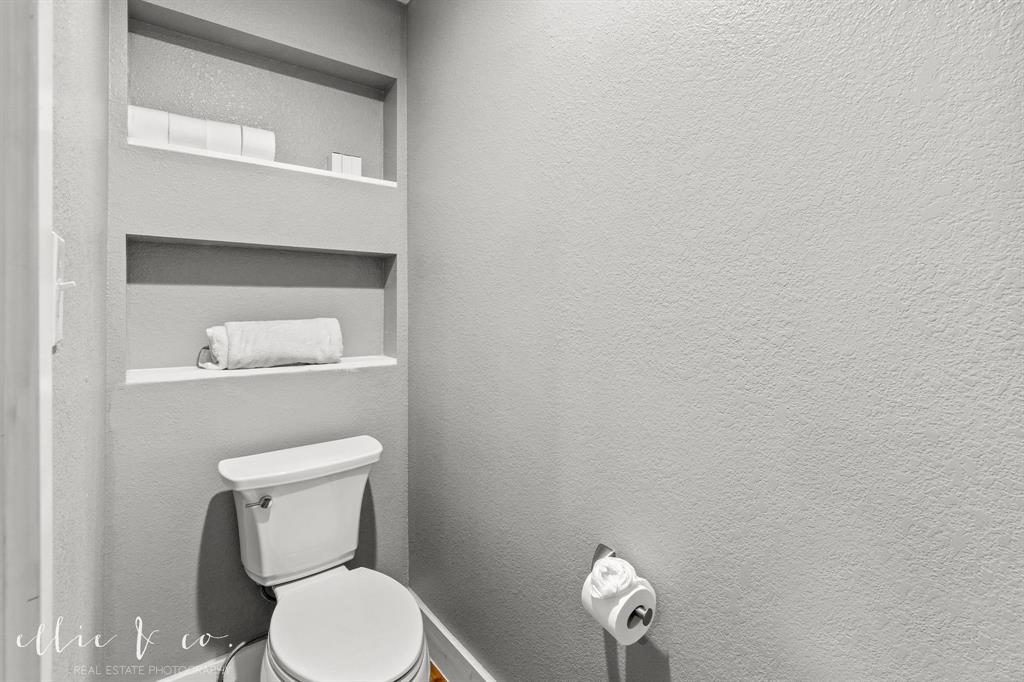 342 County Road 644 Merkel, TX 79536 - Photo 18 of 36 a white toilet sitting next to a white cabinet