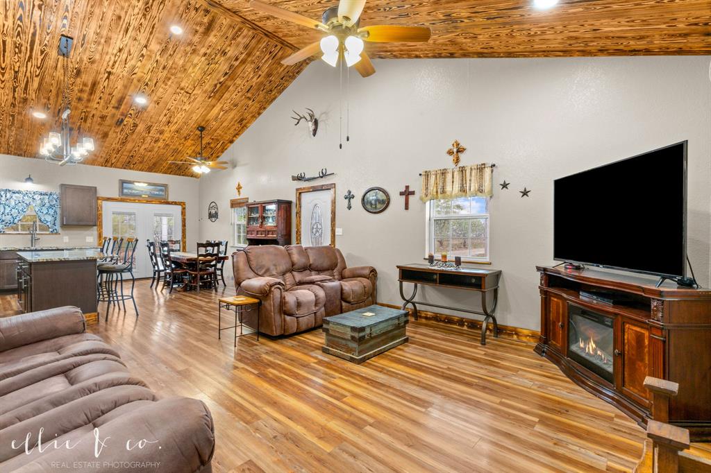 342 County Road 644 Merkel, TX 79536 - Photo 2 of 36 a living room with furniture and a flat screen tv