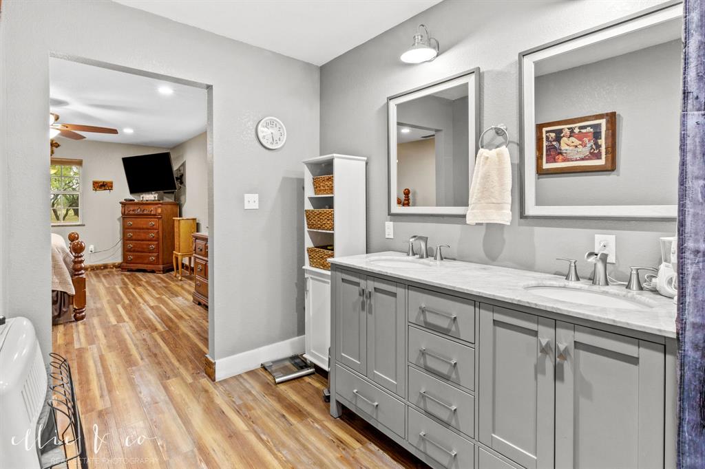 342 County Road 644 Merkel, TX 79536 - Photo 20 of 36 a spacious bathroom with a granite countertop sink mirror and vanity