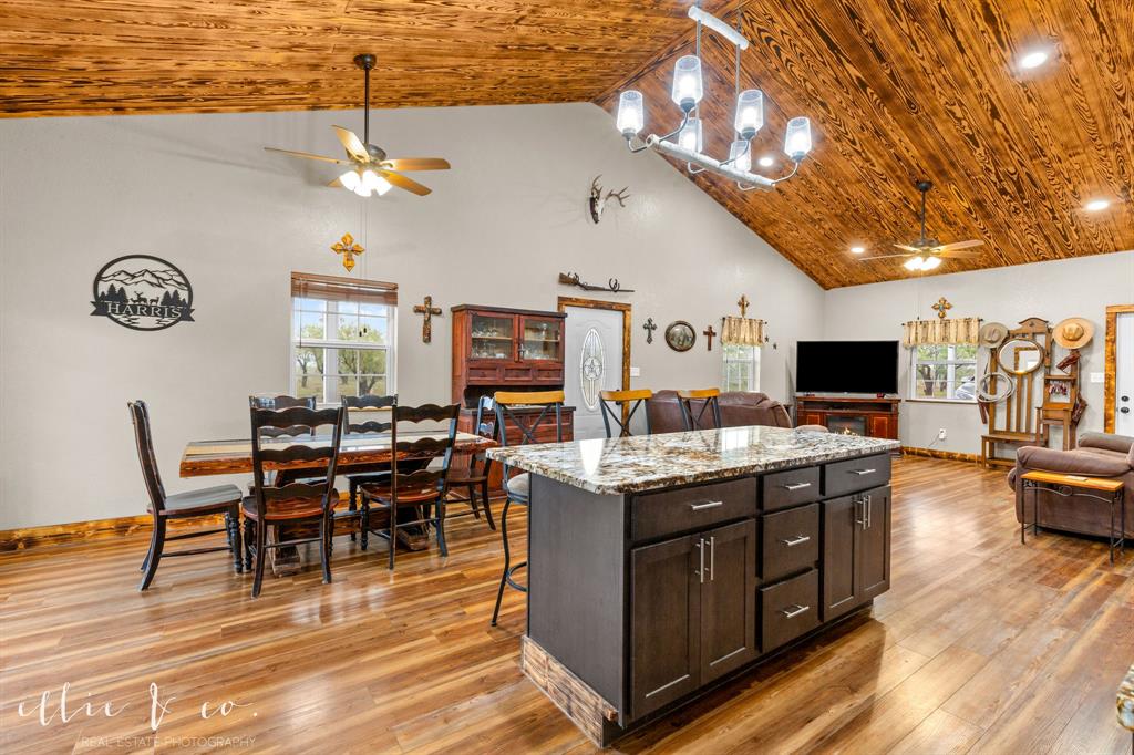 342 County Road 644 Merkel, TX 79536 - Photo 36 of 36 a view of a dining room with furniture a chandelier and wooden floor