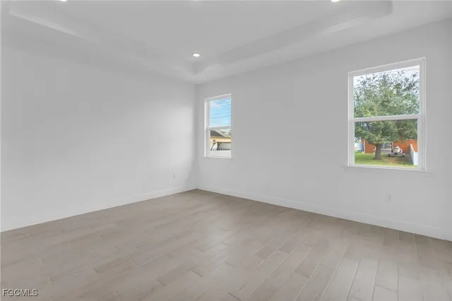 an empty room with windows