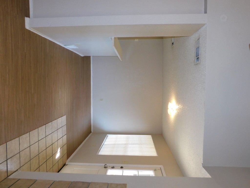 2223 Katy Lane, Unit B Georgetown, TX 78626 - Photo 2 of 11 a view of an empty room with window