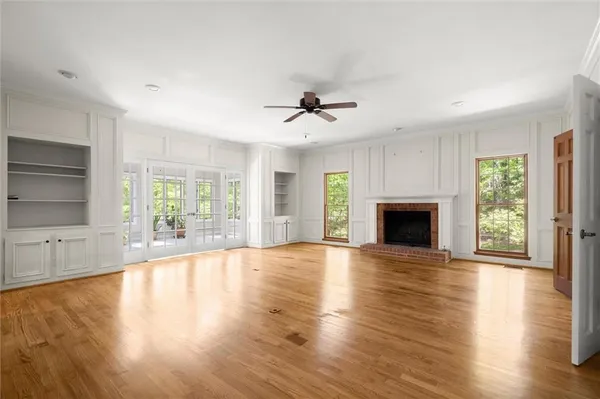 a kitchen with wooden cabinets and a stove top oven