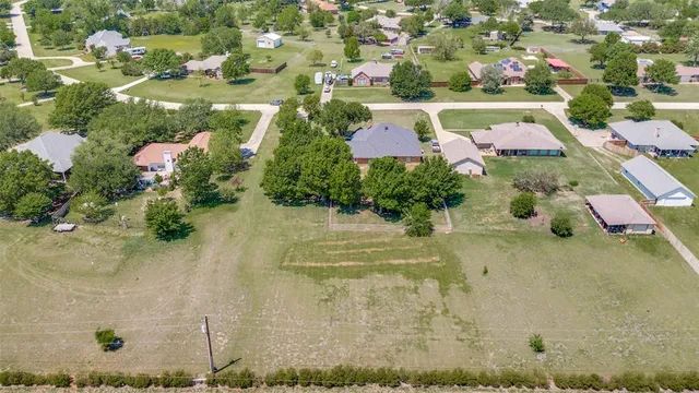 an aerial view of residential house with outdoor space
