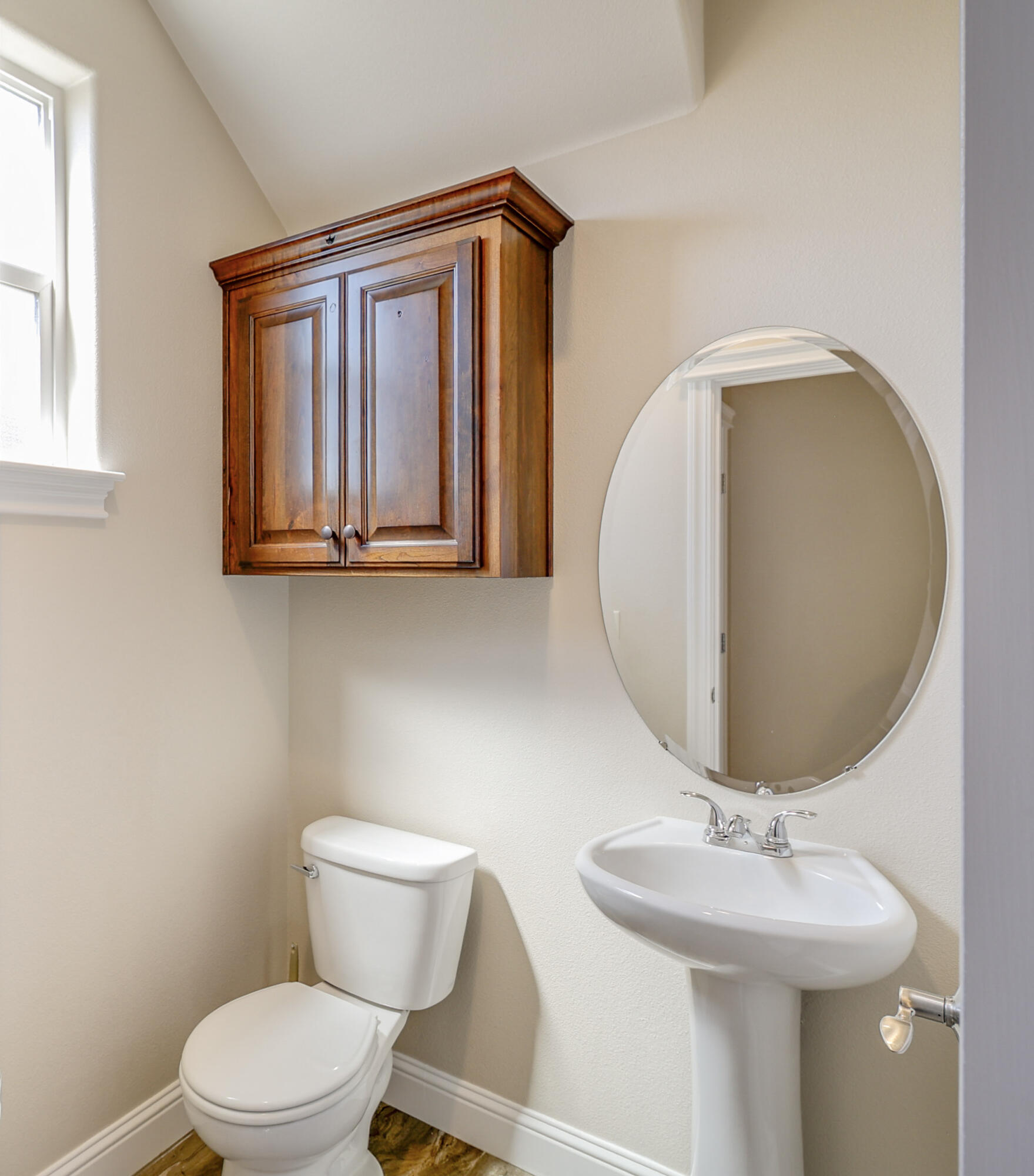 3863 Indian Wells Lane Redding, CA 96002 - Photo 12 of 63 a bathroom with a toilet sink and mirror