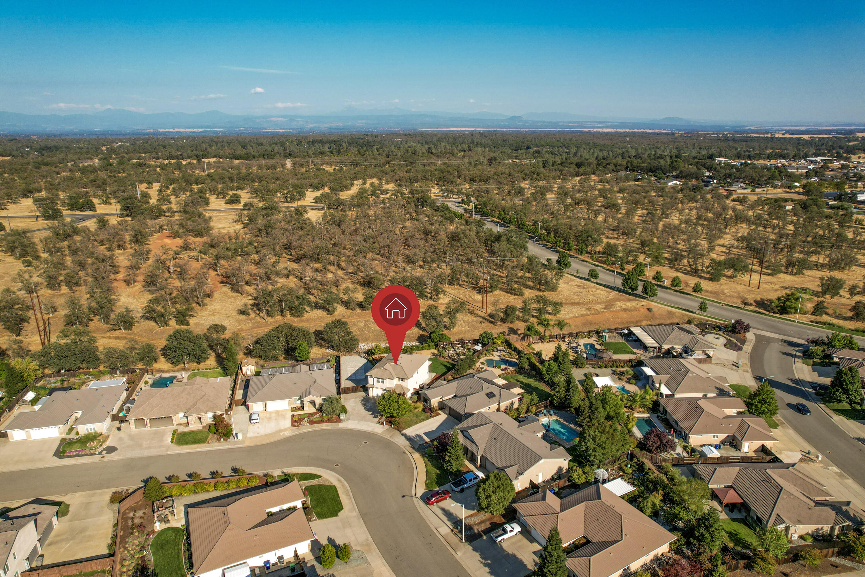3863 Indian Wells Lane Redding, CA 96002 - Photo 42 of 63 an aerial view of residential building with outdoor space