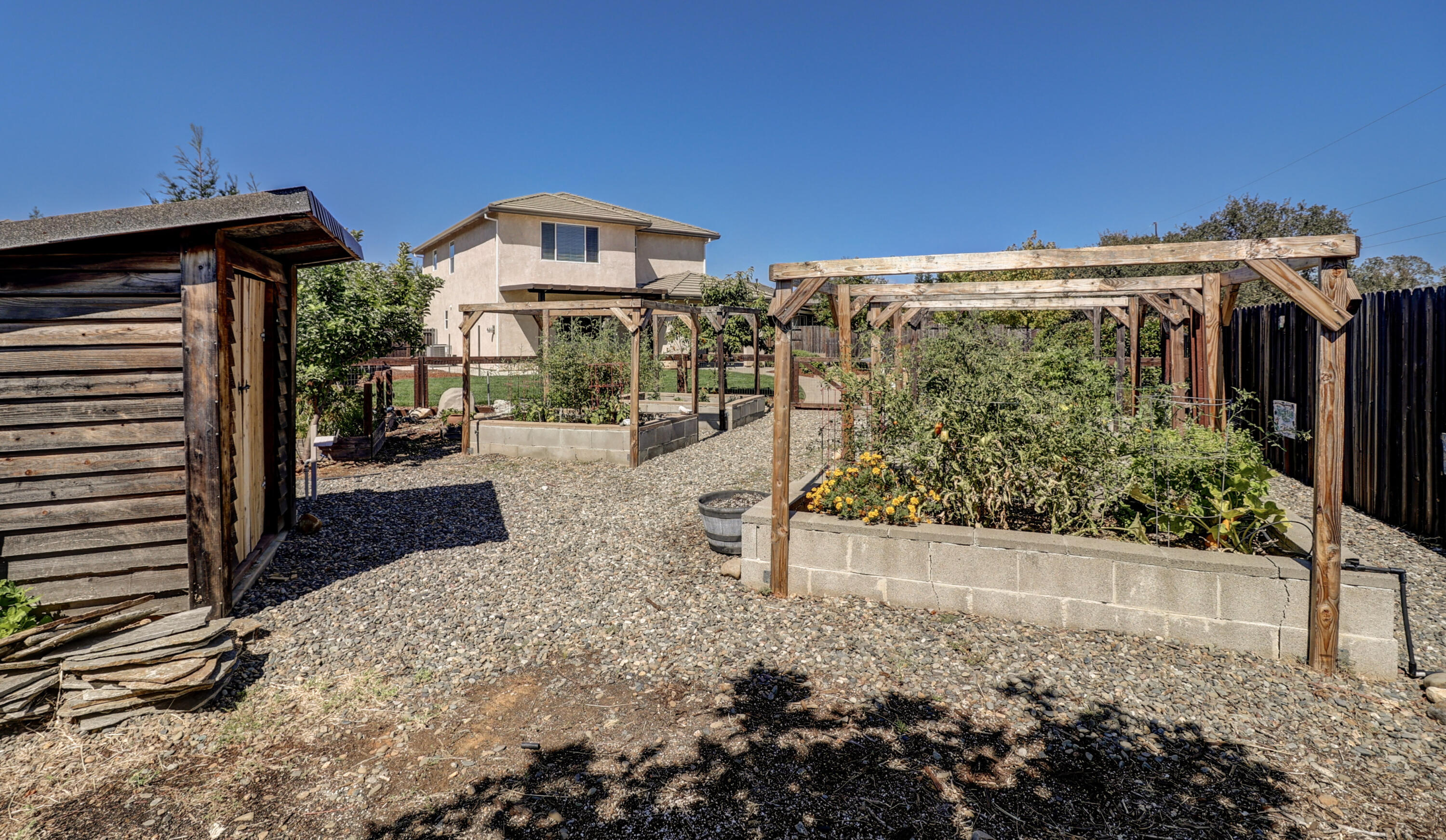 3863 Indian Wells Lane Redding, CA 96002 - Photo 56 of 63 a view of a large building with a yard