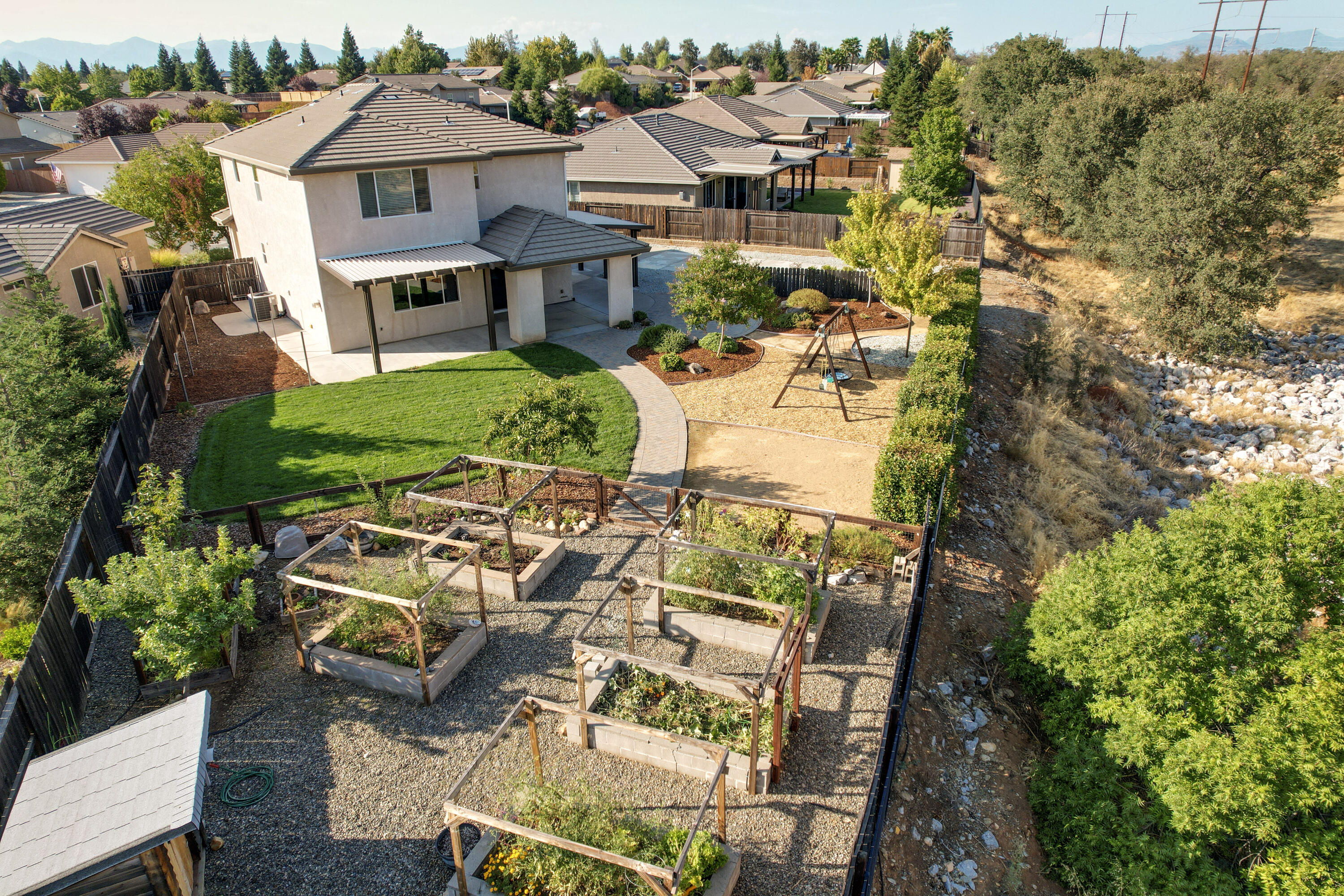 3863 Indian Wells Lane Redding, CA 96002 - Photo 60 of 63 an aerial view of residential houses with yard