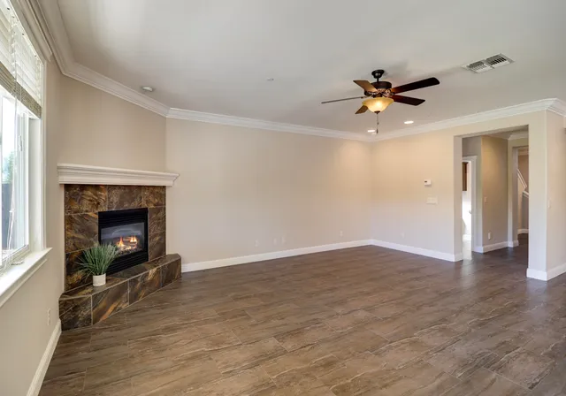 a kitchen with stainless steel appliances granite countertop wooden cabinets a sink and dishwasher