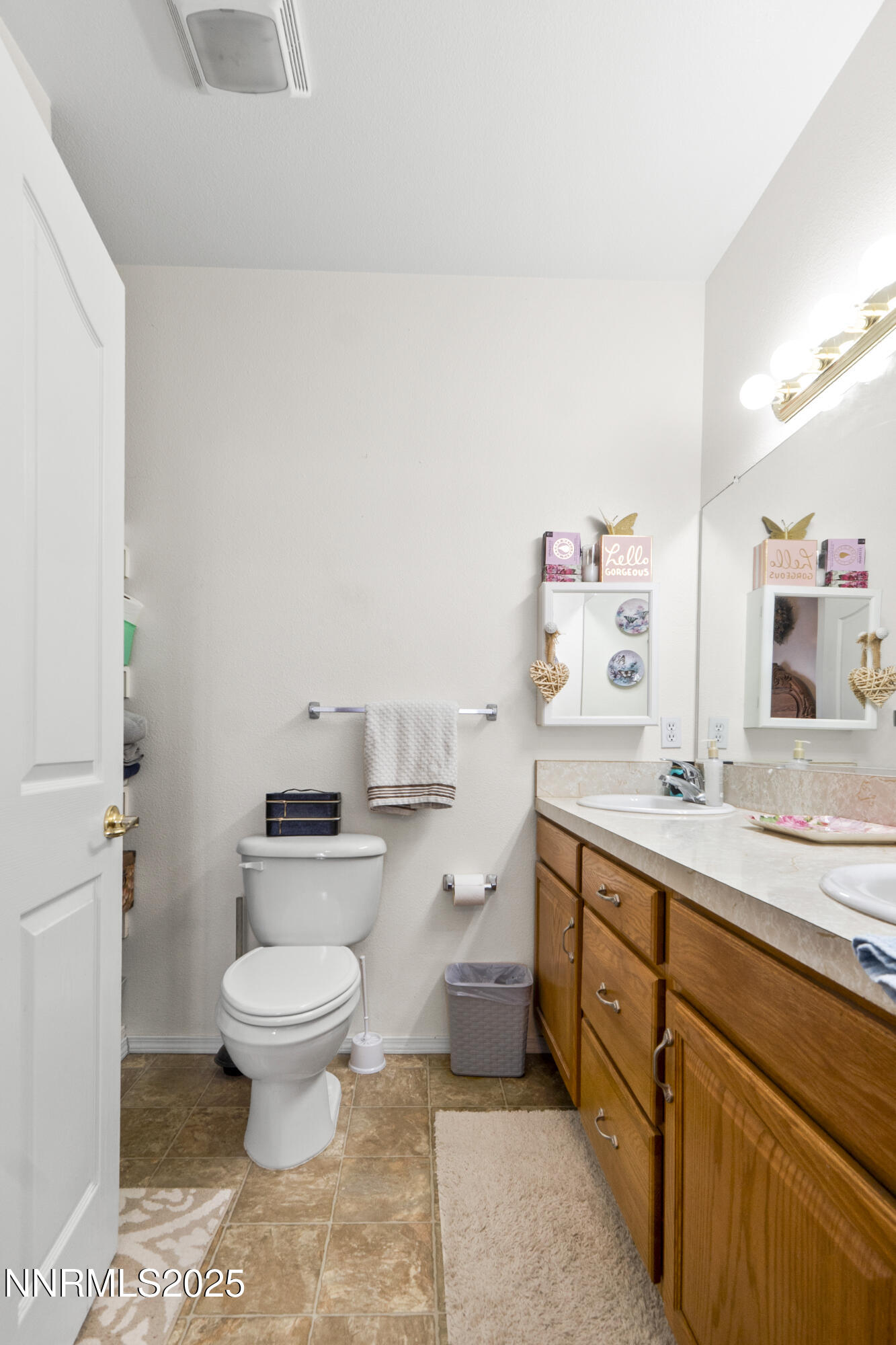 6990 Airport Road Winnemucca, NV 89445 - Photo 20 of 47 a spacious bathroom with a sink toilet and a mirror