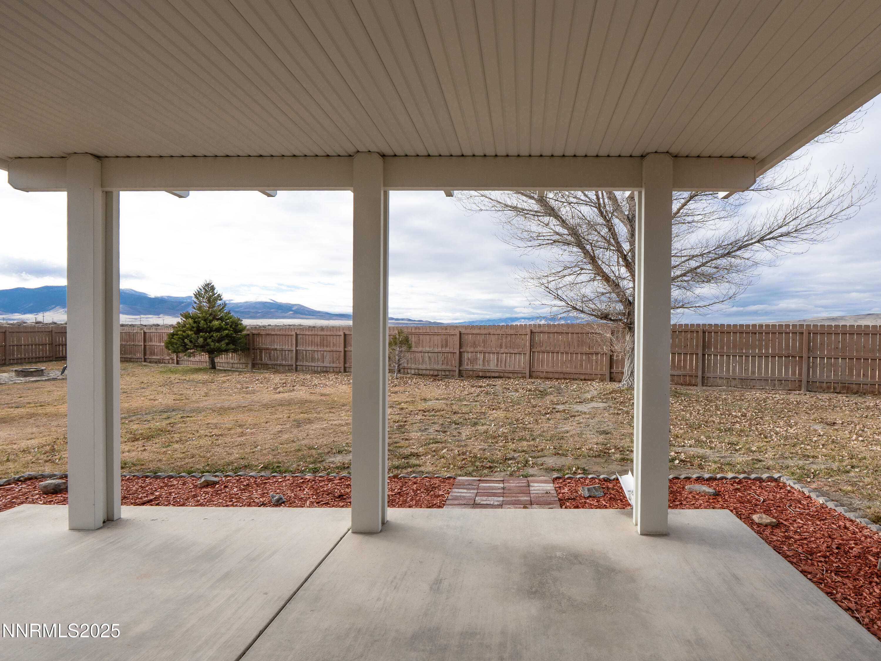 6990 Airport Road Winnemucca, NV 89445 - Photo 28 of 47 a view of a porch with a floor to ceiling window