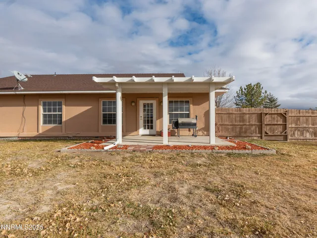 front view of a house with a big yard
