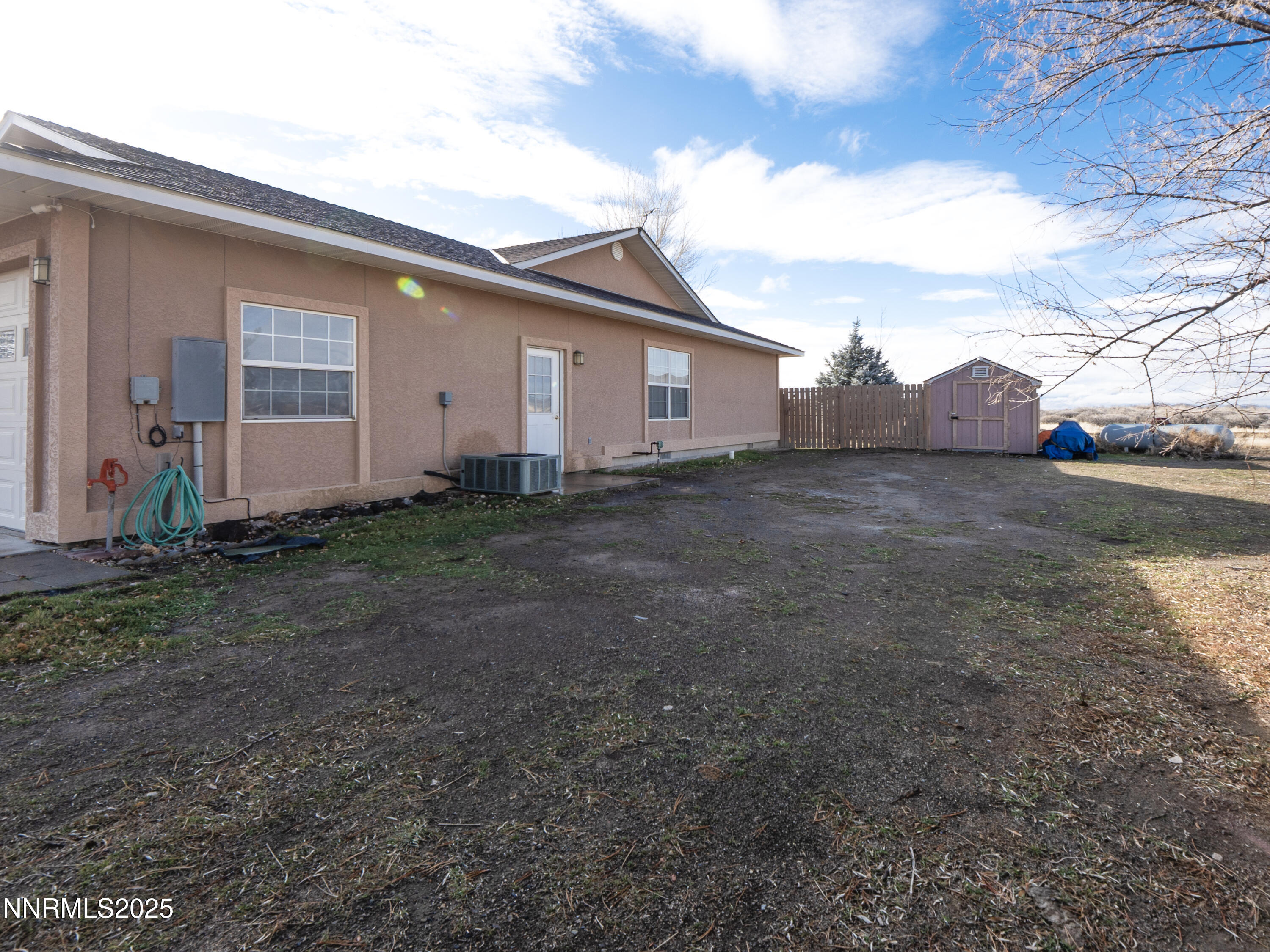 6990 Airport Road Winnemucca, NV 89445 - Photo 42 of 47 a view of a backyard of the house