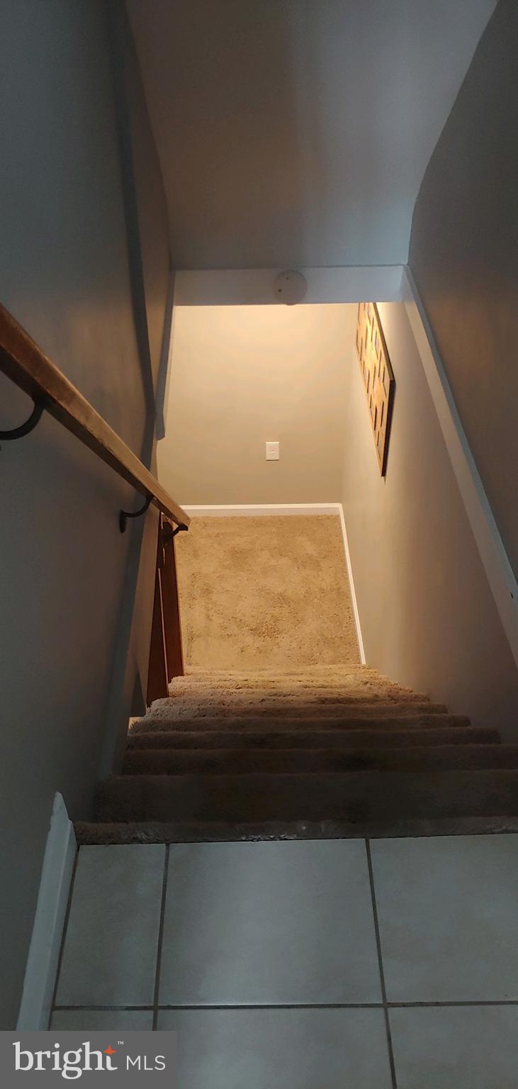 709 South Woodington Road Baltimore, MD 21229 - Photo 25 of 32 Basement Stairway