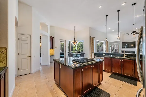a view of a patio with a table and chairs