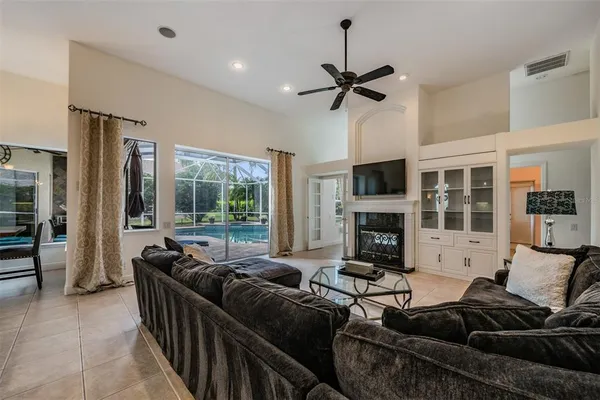 a front view of a house with a garden and plants