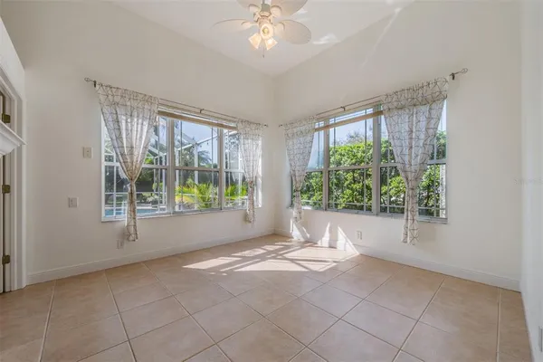 an aerial view of a houses with outdoor space and lake view
