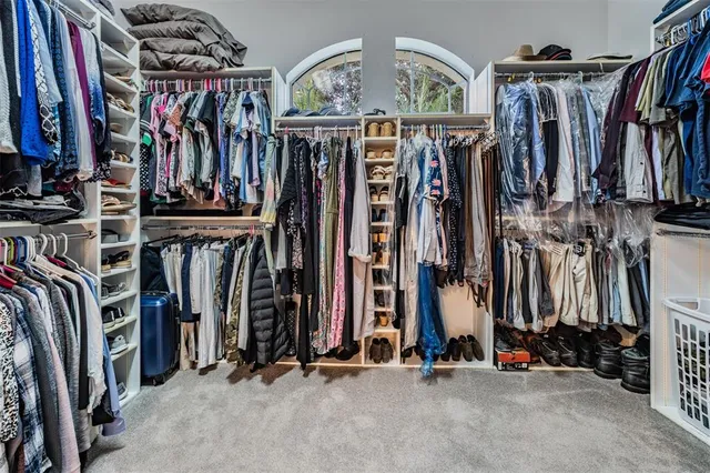 an aerial view of a city and lake view