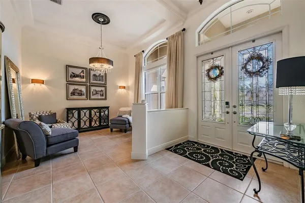a dining room with furniture and window