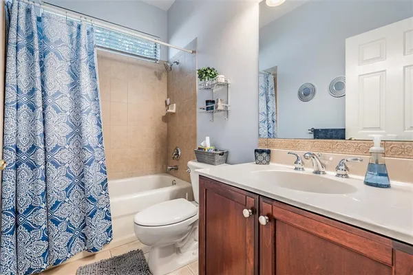 a view of a swimming pool with a lounge chair