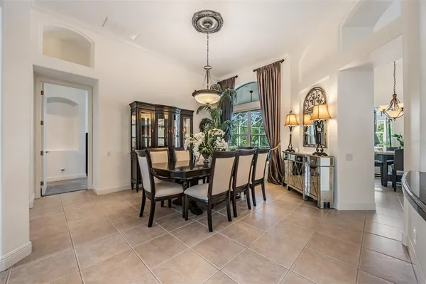 a large kitchen with stainless steel appliances lots of counter top space