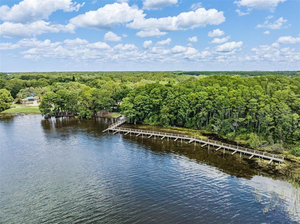 3727 Janus Way Palm Harbor, FL 34685 - Photo 77 of 98 a view of a lake with outdoor space