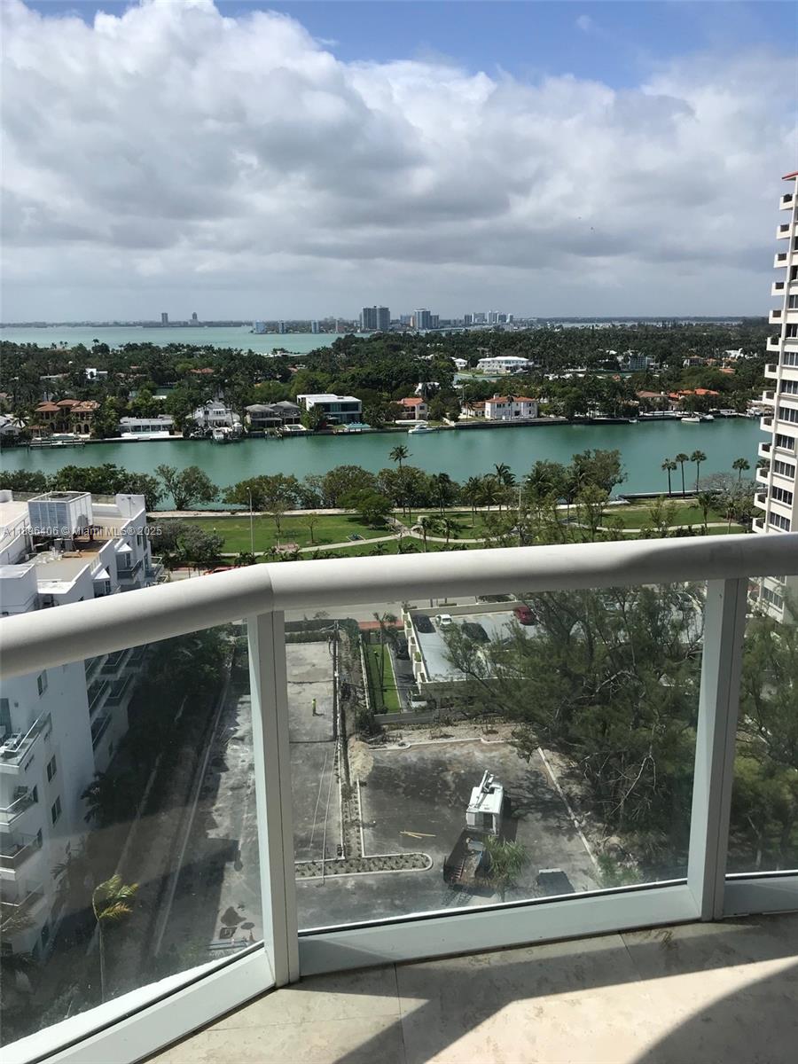 6365 Collins Avenue, Unit 1508 Miami Beach, FL 33141 - Photo 17 of 18 a view of a lake from a balcony