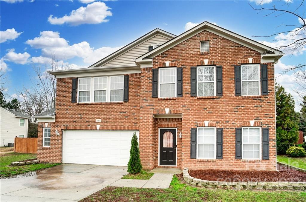 207 Old Carriage Road Clover, SC 29710 - Photo 2 of 48 a front view of a house with a yard
