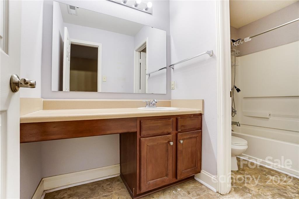207 Old Carriage Road Clover, SC 29710 - Photo 27 of 48 a bathroom with a sink a toilet and shower