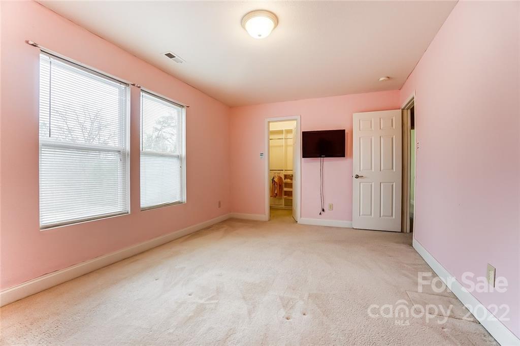 207 Old Carriage Road Clover, SC 29710 - Photo 28 of 48 an empty room with a window and a flat screen tv