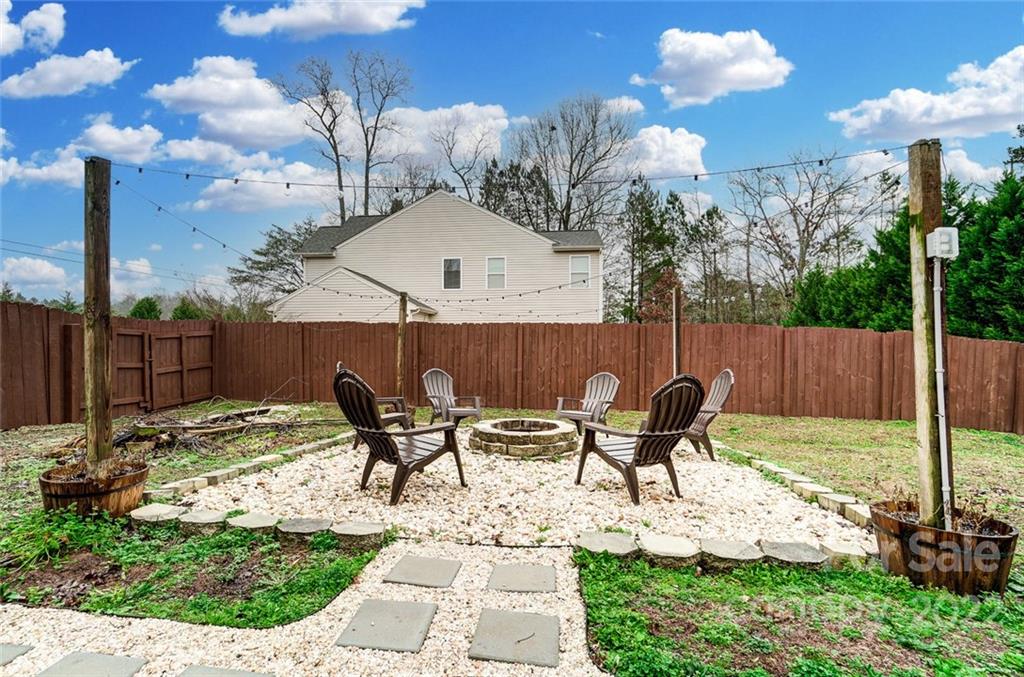 207 Old Carriage Road Clover, SC 29710 - Photo 45 of 48 a view of backyard with sitting area