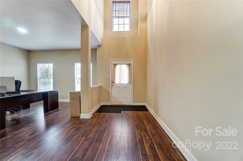 207 Old Carriage Road Clover, SC 29710 - Photo 6 of 48 wooden floor in a hall with a window