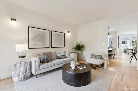 a view of a balcony with wooden floor