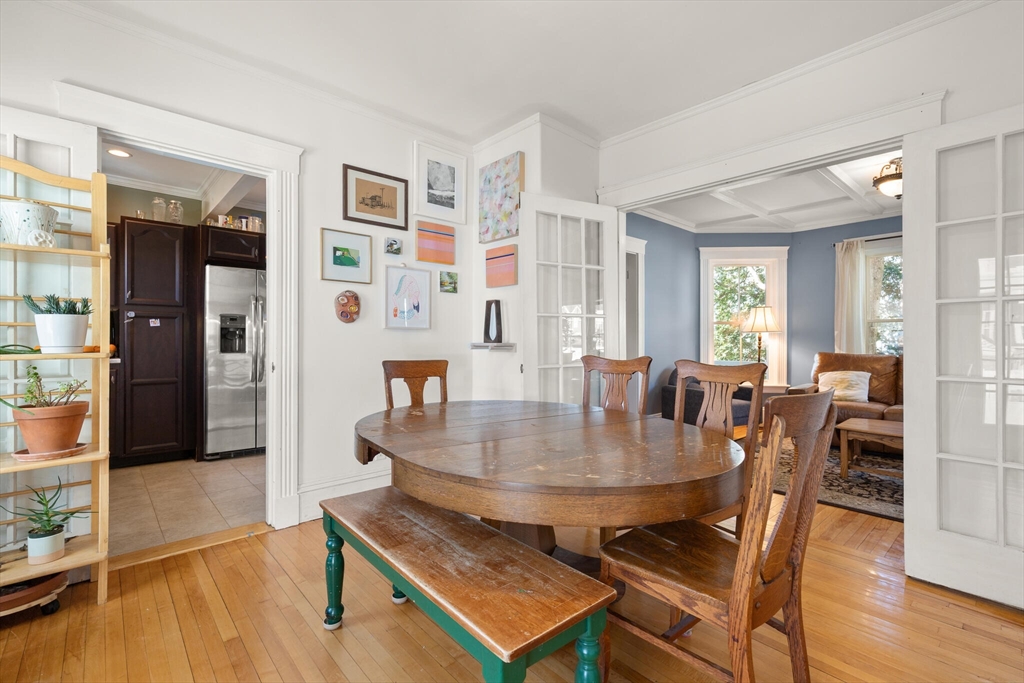 222 Lawrence Street Haverhill, MA 01830 - Photo 12 of 32 a view of a dining room with furniture and wooden floor