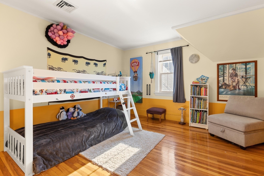 222 Lawrence Street Haverhill, MA 01830 - Photo 20 of 32 a bed room with furniture and a window