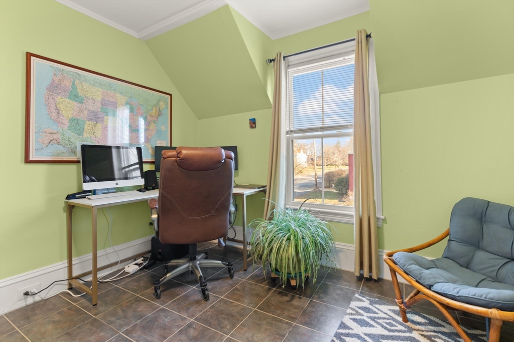 222 Lawrence Street Haverhill, MA 01830 - Photo 22 of 32 a living room with furniture and a window