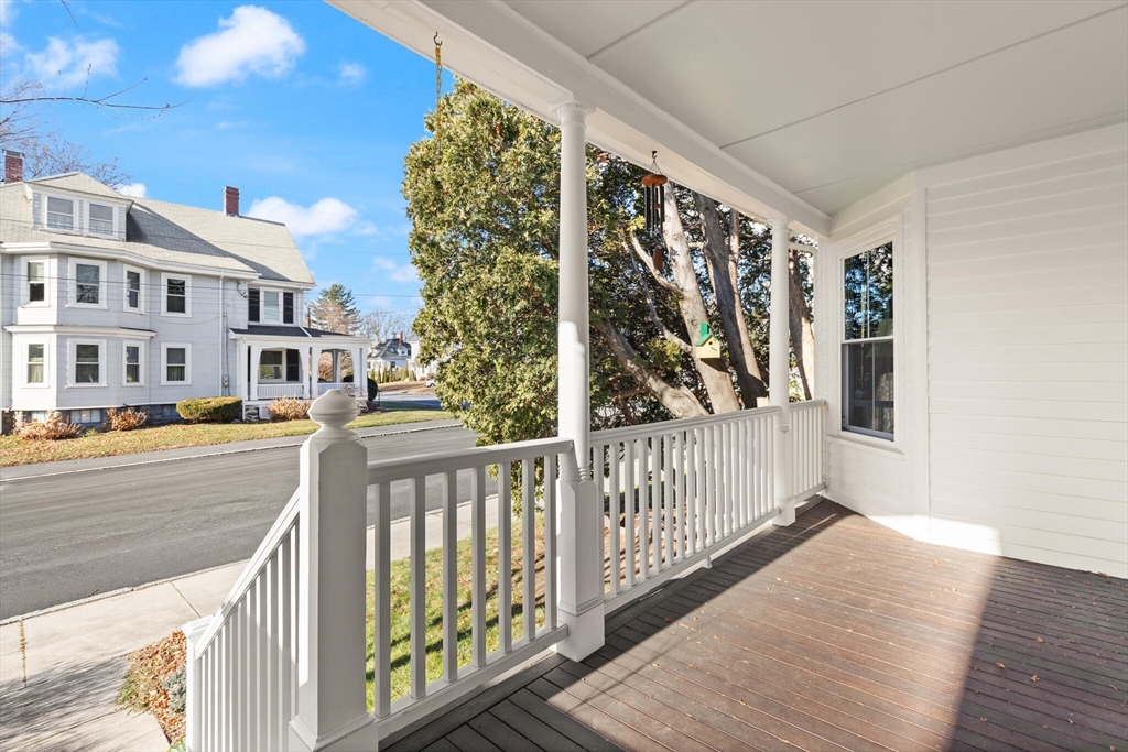 222 Lawrence Street Haverhill, MA 01830 - Photo 26 of 32 a view of a porch with wooden floor and fence
