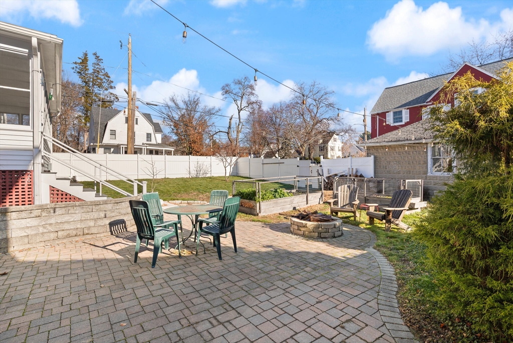 222 Lawrence Street Haverhill, MA 01830 - Photo 30 of 32 a view of a patio with swimming pool table and chairs