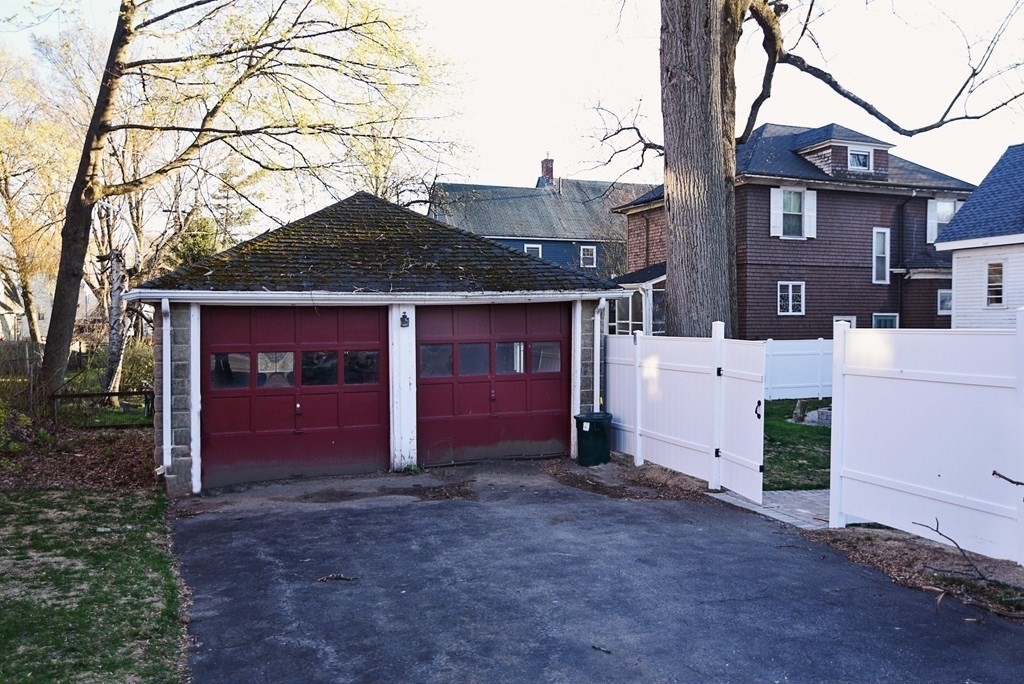 222 Lawrence Street Haverhill, MA 01830 - Photo 32 of 32 a view of a house with a yard and garage