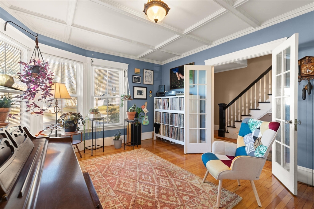 222 Lawrence Street Haverhill, MA 01830 - Photo 5 of 32 a living room with furniture and wooden floor