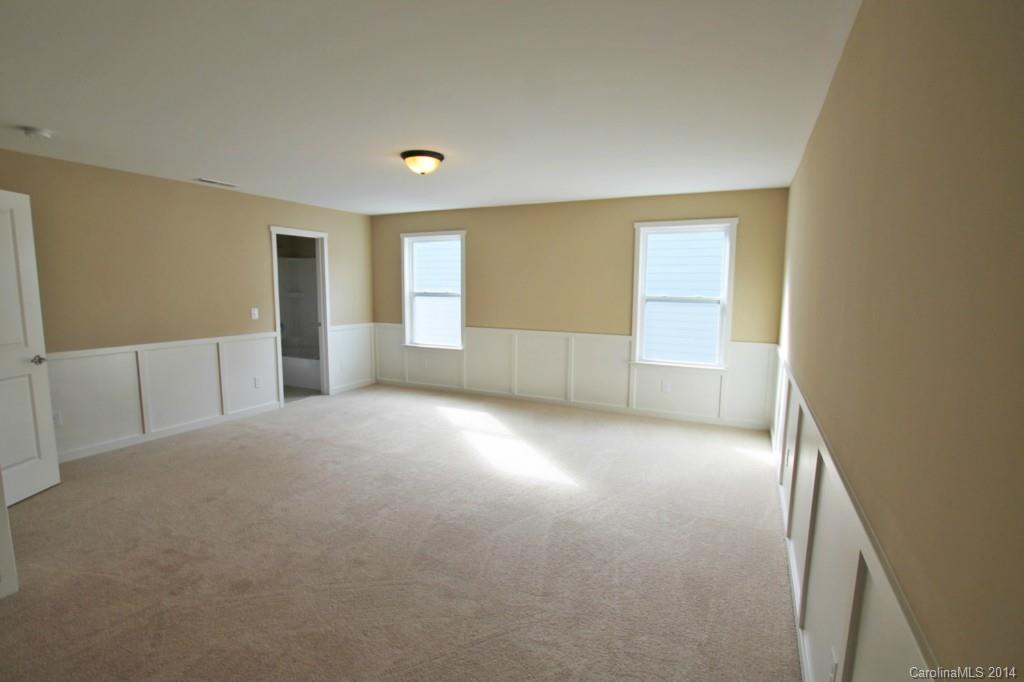 2186 Bluebell Way, Unit 170 Tega Cay, SC 29708 - Photo 12 of 15 a view of an empty room with a window