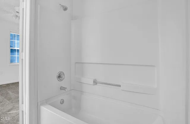 a bathroom with a bathtub